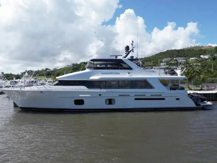 a white yacht on the water aboard SAMARITANA Yacht for Sale