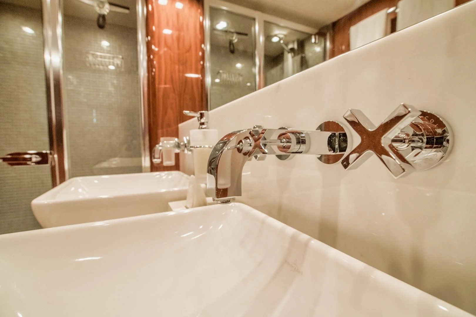 a bathtub with a faucet and a butterfly aboard VIVA LA VIDA Yacht for Sale