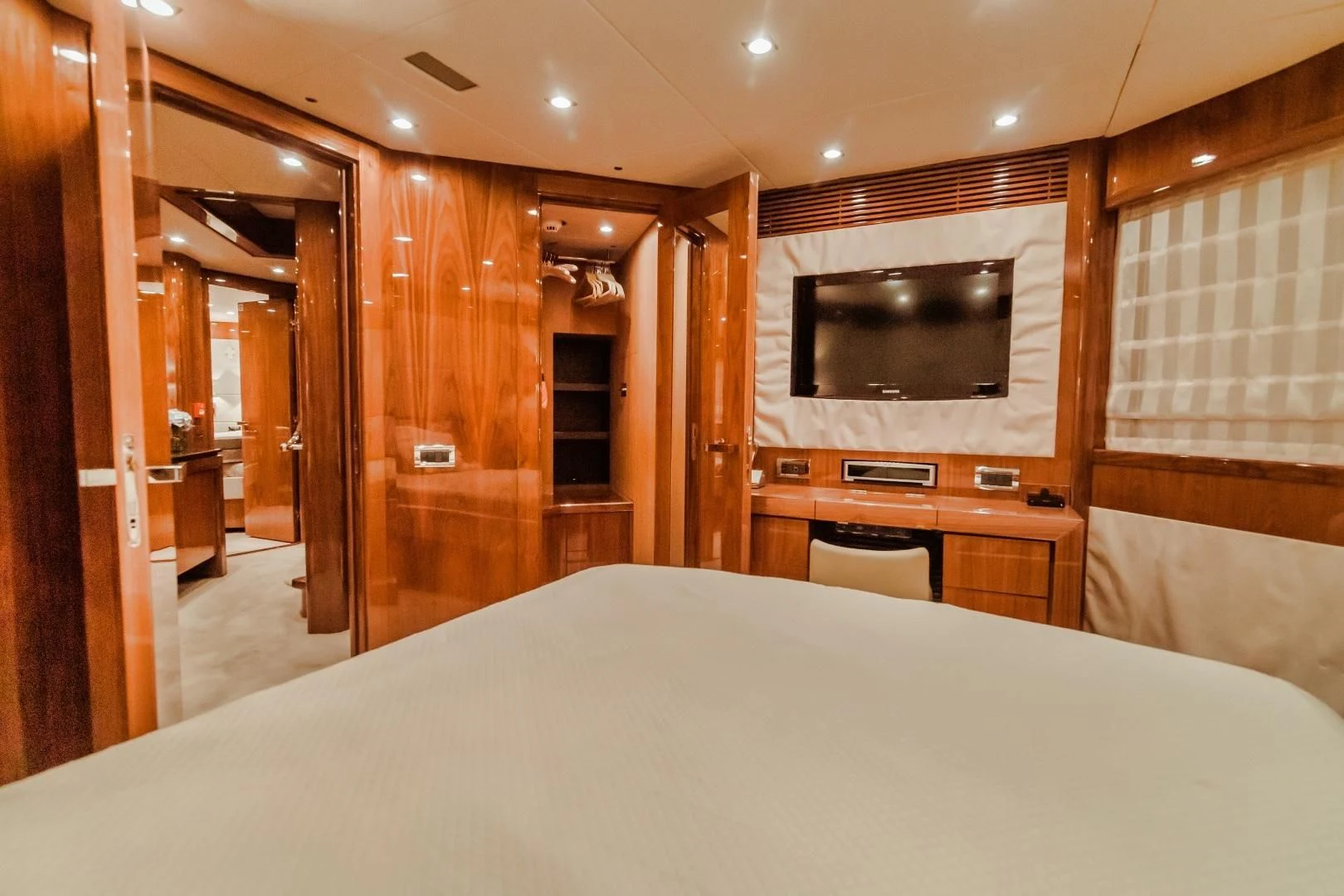 a large bed in a room aboard VIVA LA VIDA Yacht for Sale