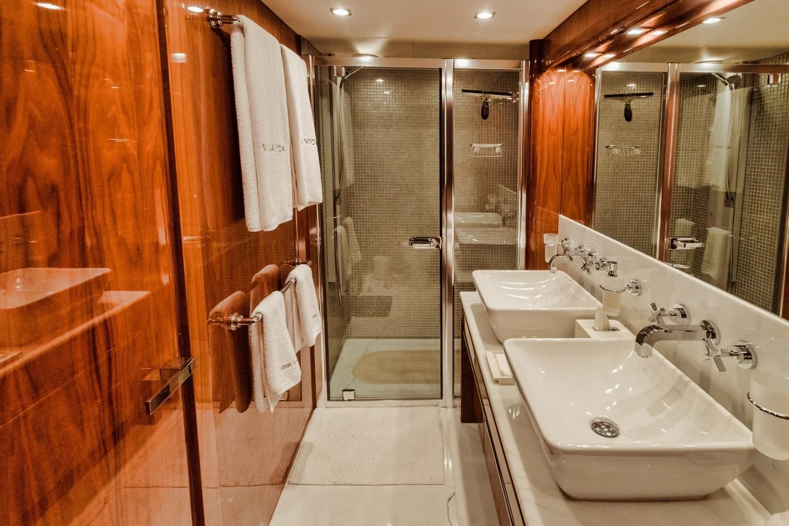 a bathroom with a standup shower aboard VIVA LA VIDA Yacht for Sale