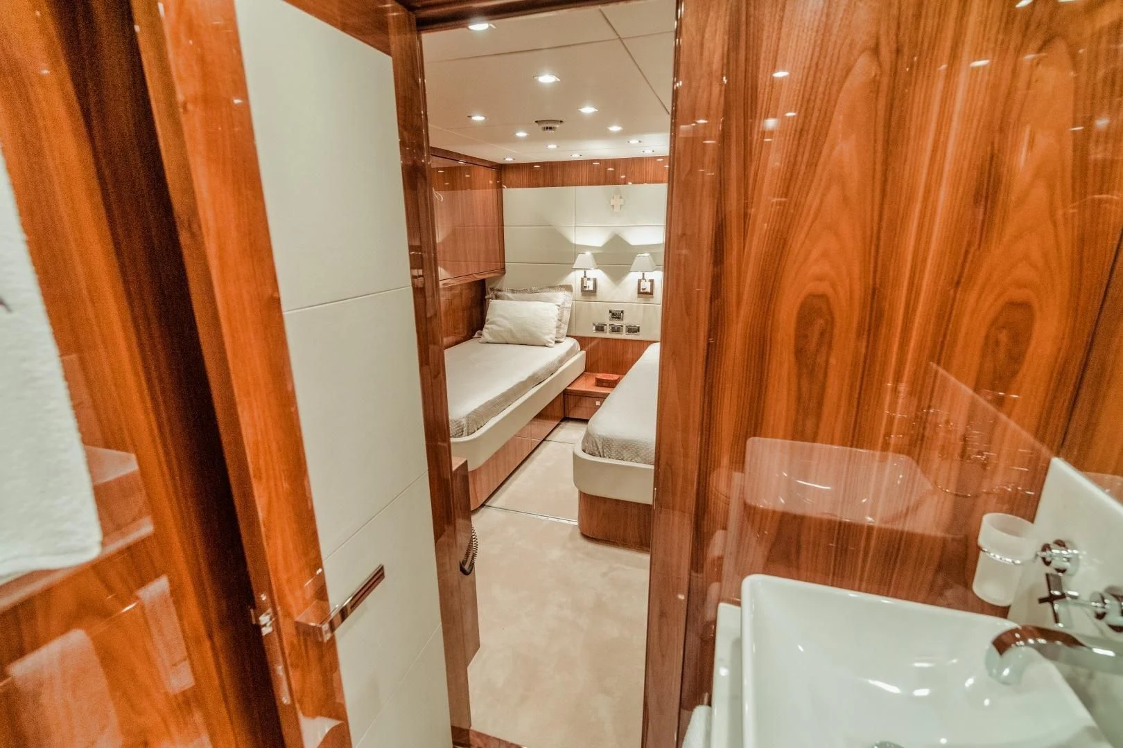 a bathroom with a tub and a sink aboard VIVA LA VIDA Yacht for Sale