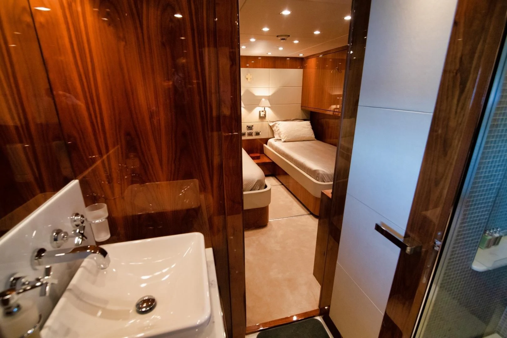 a bathroom with a sink and a bathtub aboard VIVA LA VIDA Yacht for Sale