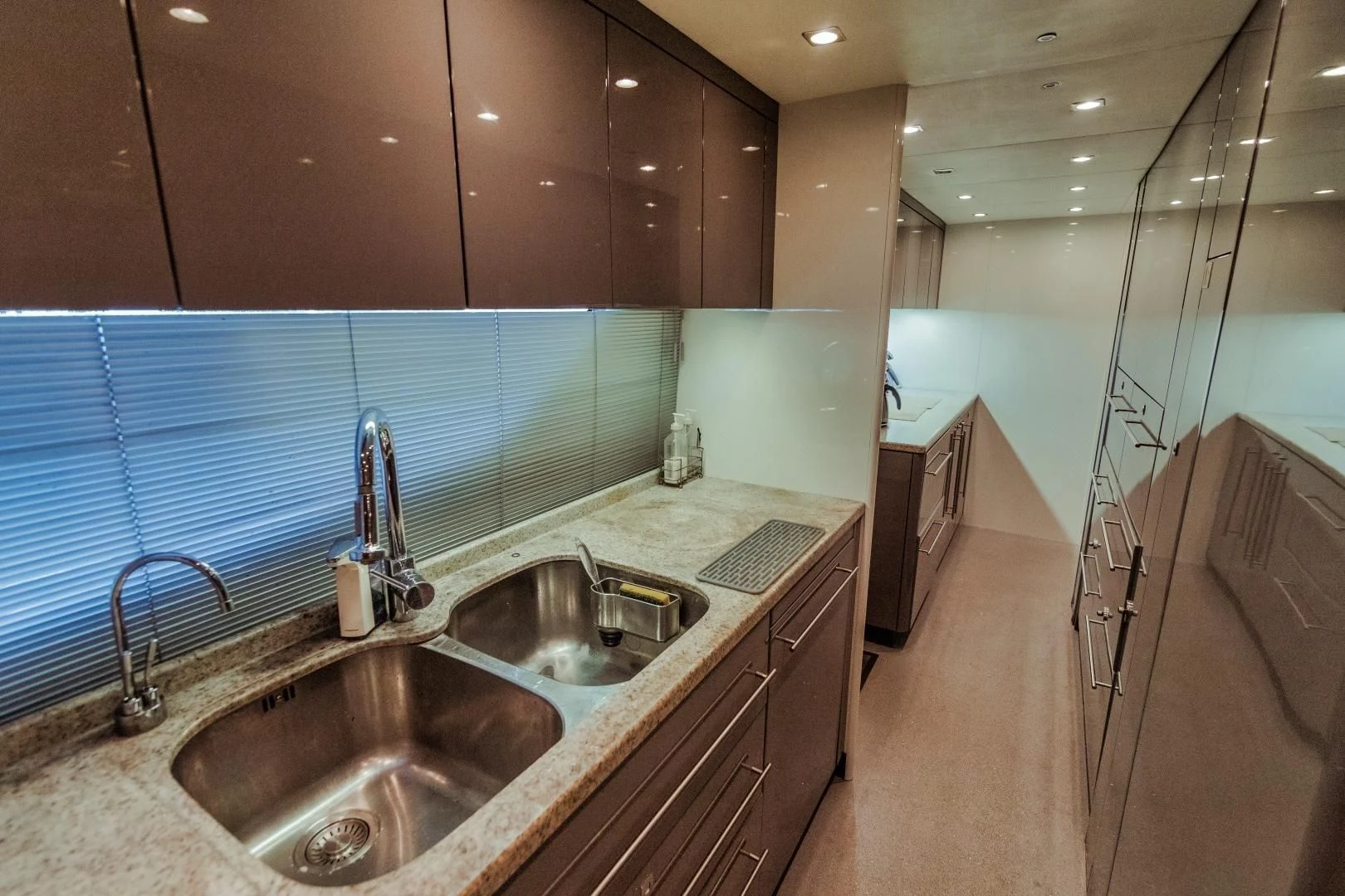 a bathroom with a sink and a countertop aboard VIVA LA VIDA Yacht for Sale