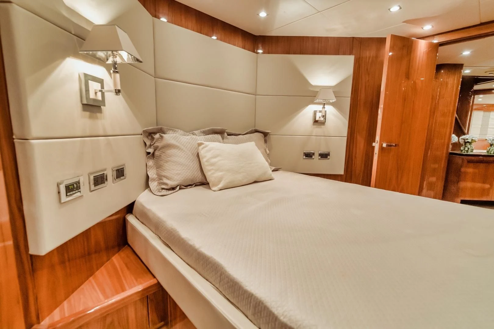 a bed with a white sheet aboard VIVA LA VIDA Yacht for Sale