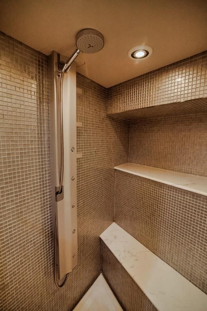 a shower with a glass door aboard VIVA LA VIDA Yacht for Sale
