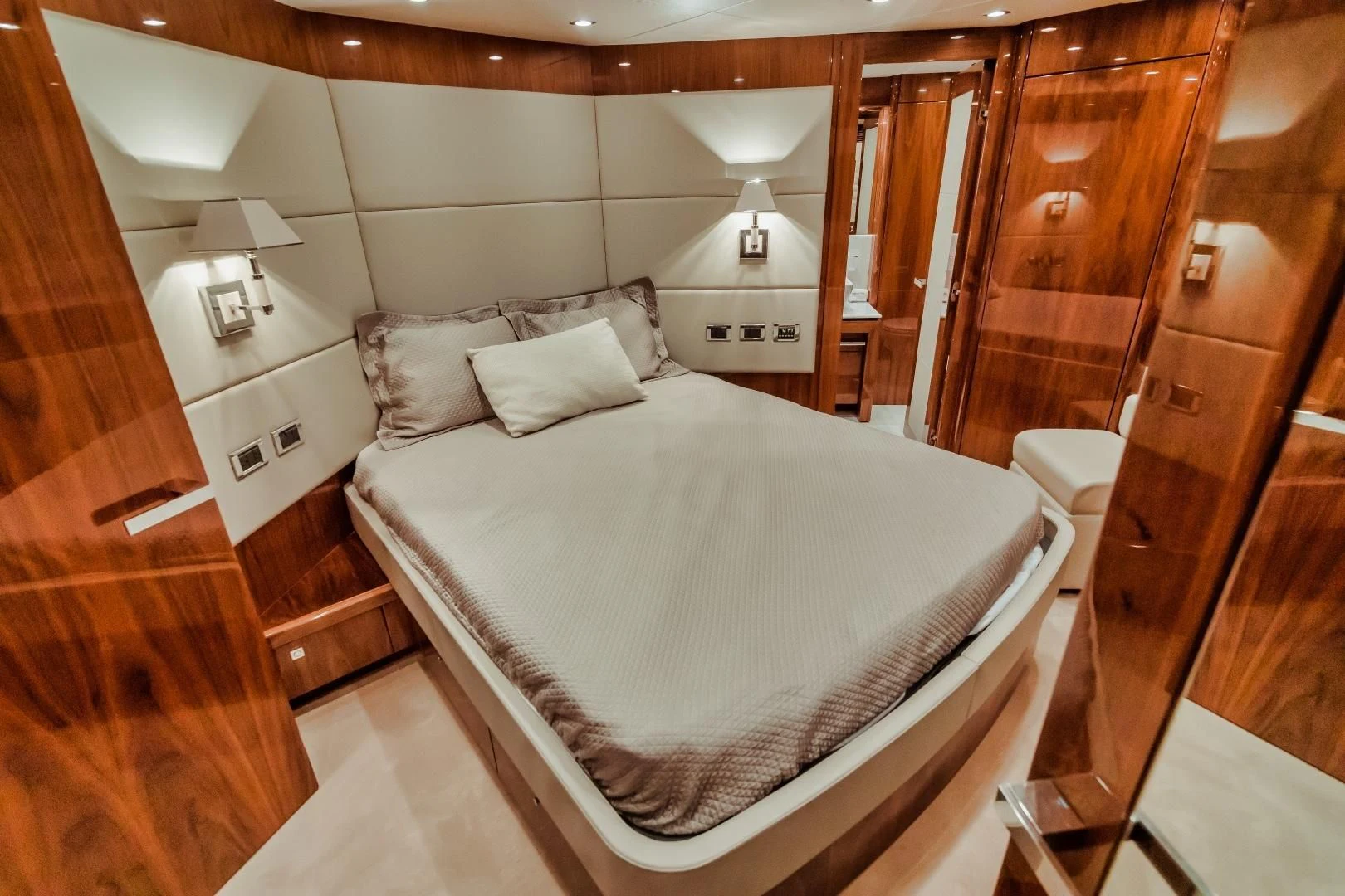 a bed in a room aboard VIVA LA VIDA Yacht for Sale