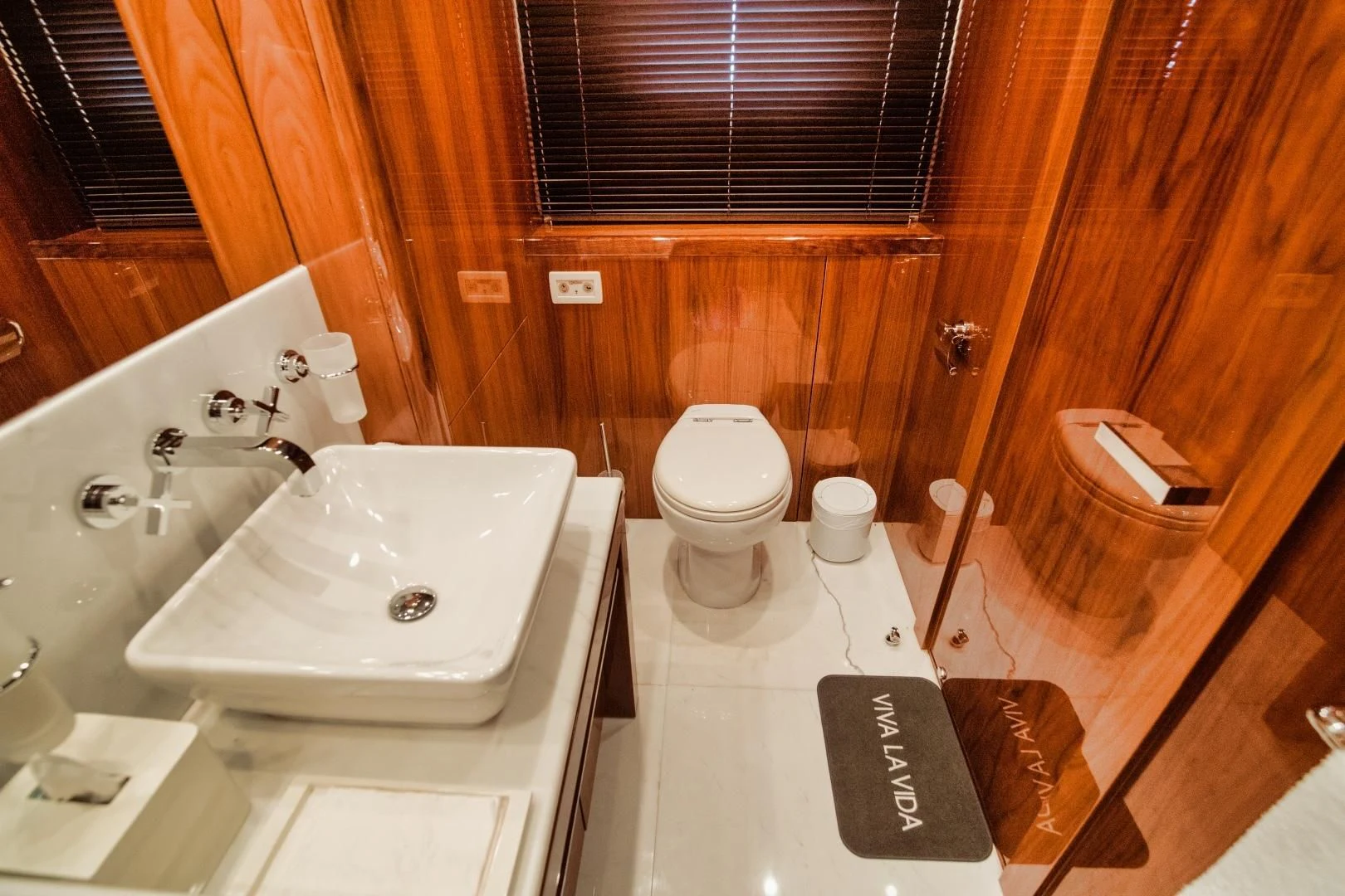 a bathroom with a sink toilet and a bathtub aboard VIVA LA VIDA Yacht for Sale