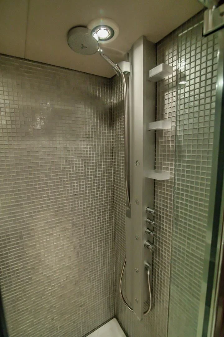 a shower with a glass door aboard VIVA LA VIDA Yacht for Sale