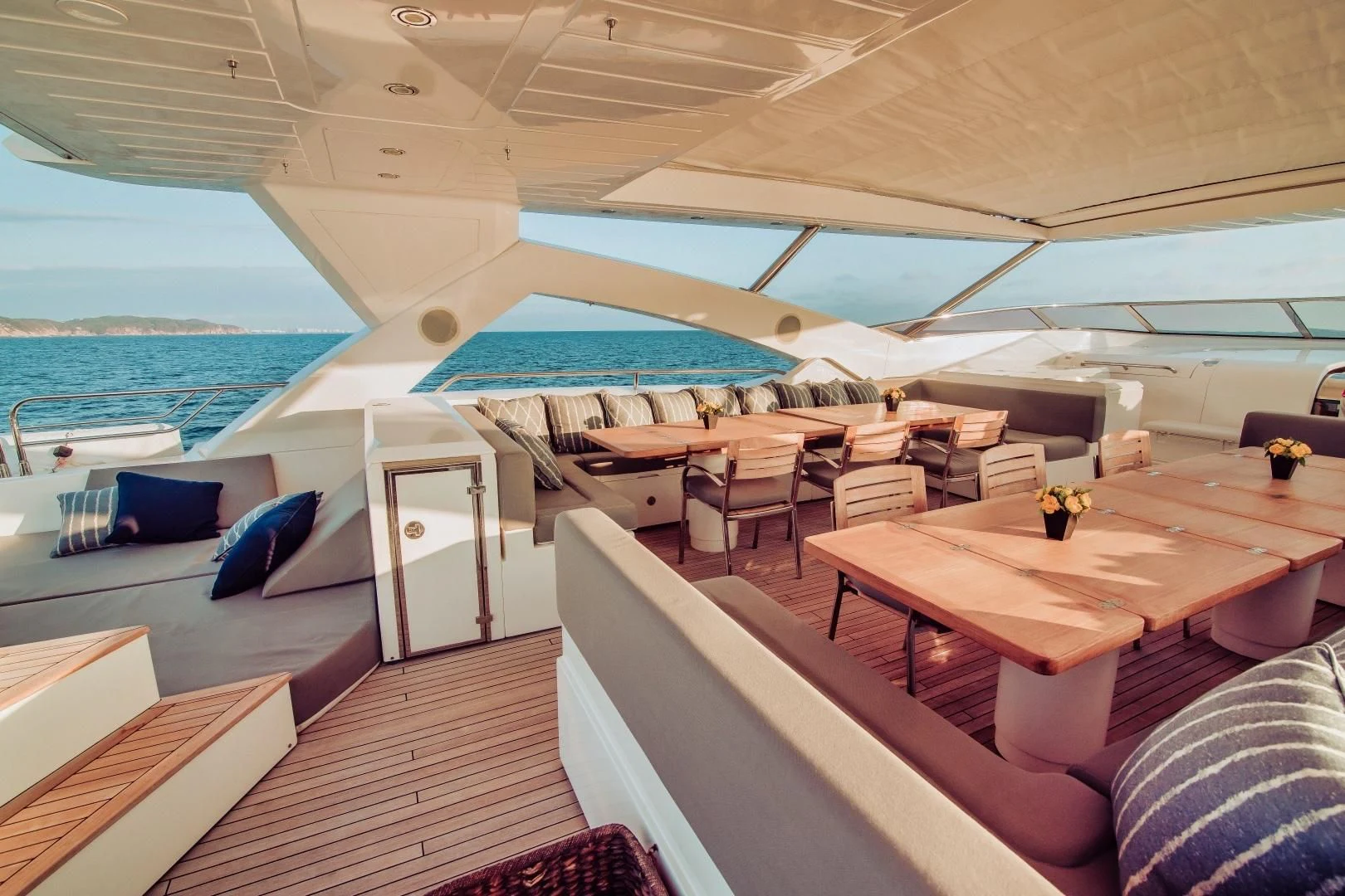 a boat with a table and chairs aboard VIVA LA VIDA Yacht for Sale