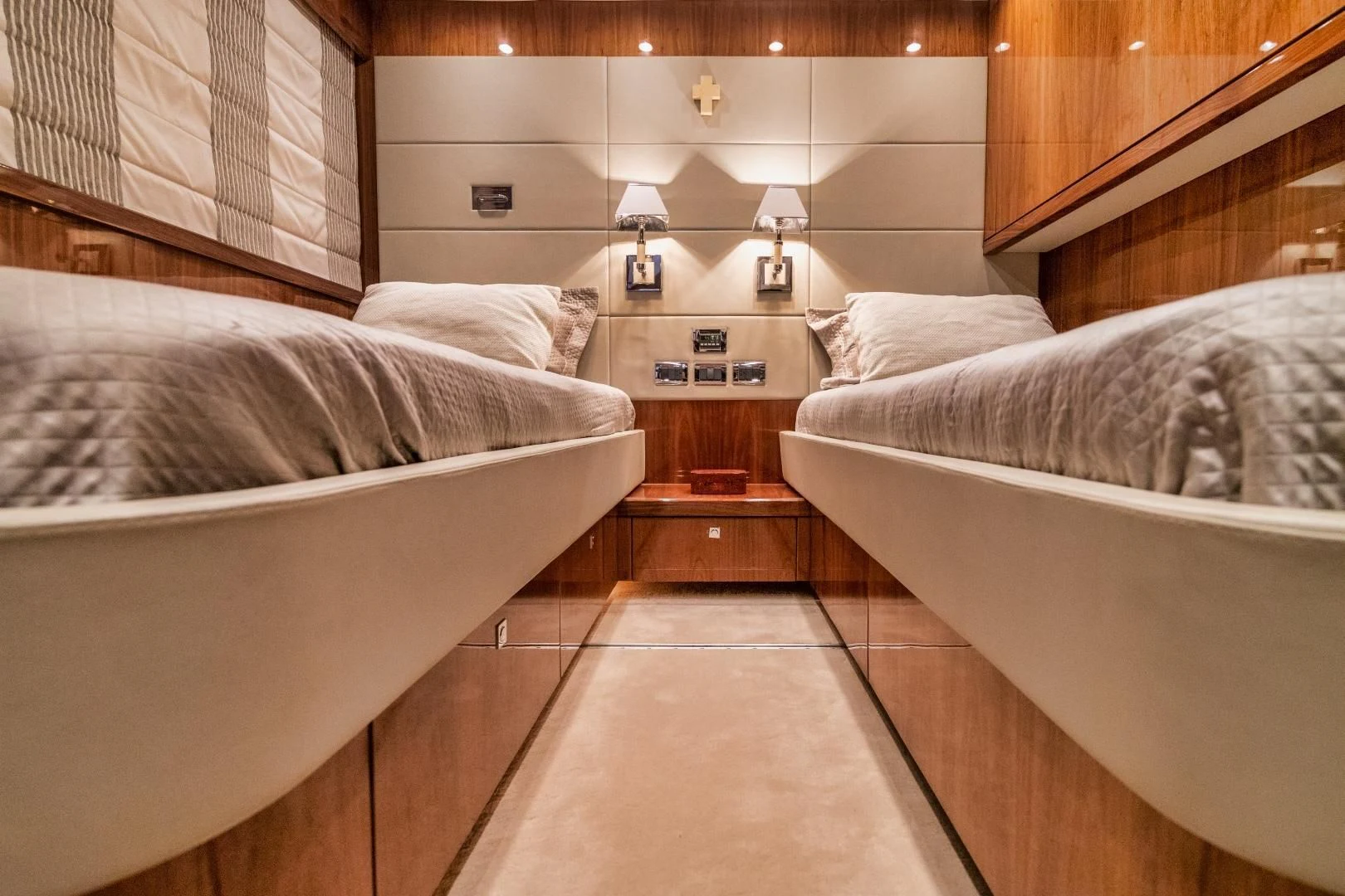 a room with a bed and a table aboard VIVA LA VIDA Yacht for Sale