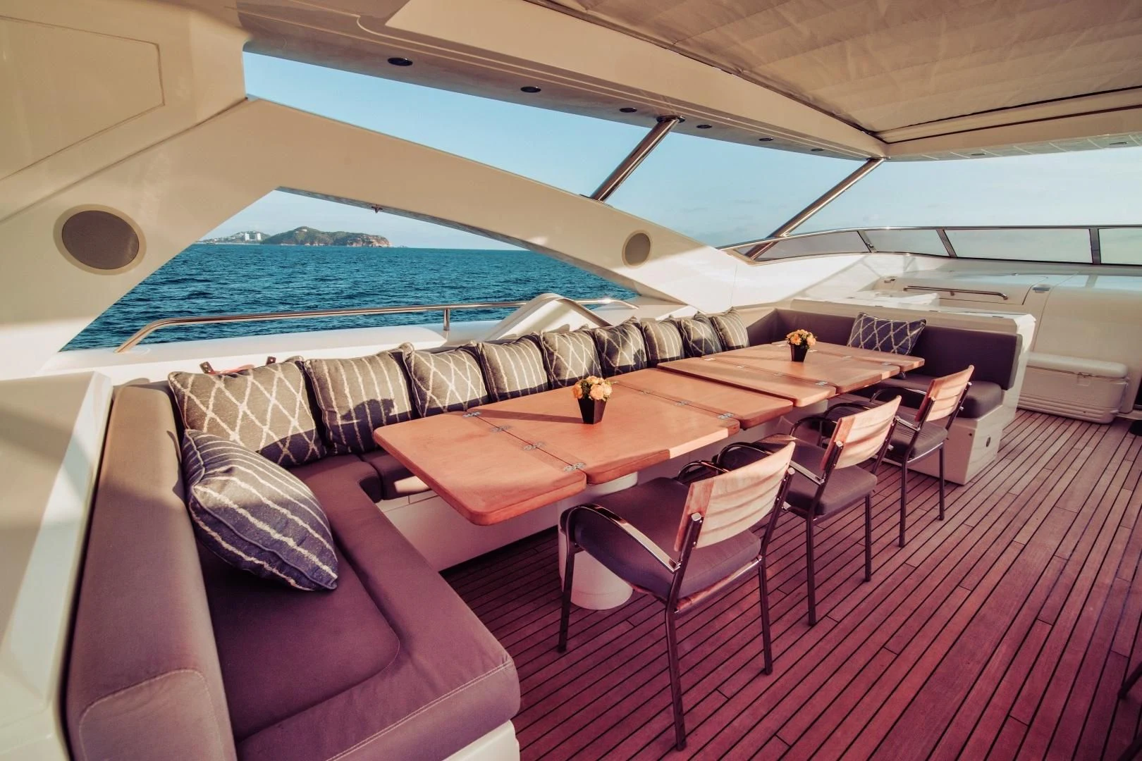 a tent with a table and chairs aboard VIVA LA VIDA Yacht for Sale