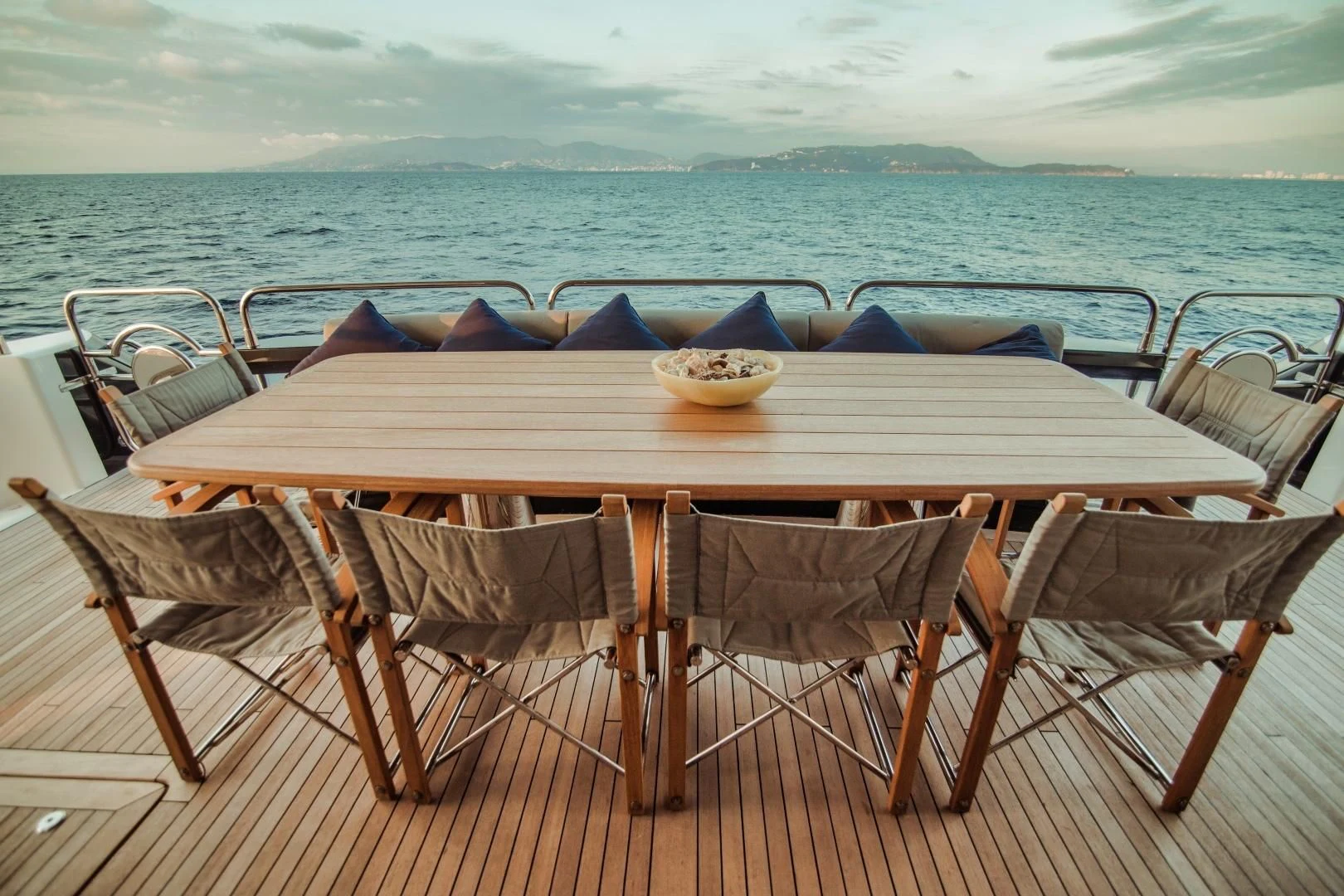 a table with chairs around it aboard VIVA LA VIDA Yacht for Sale