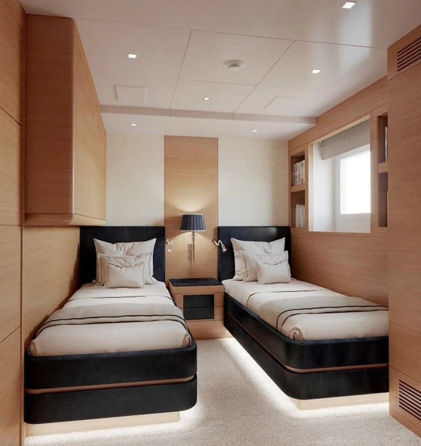 a hotel room with two beds aboard TONIC BLUE Yacht for Sale