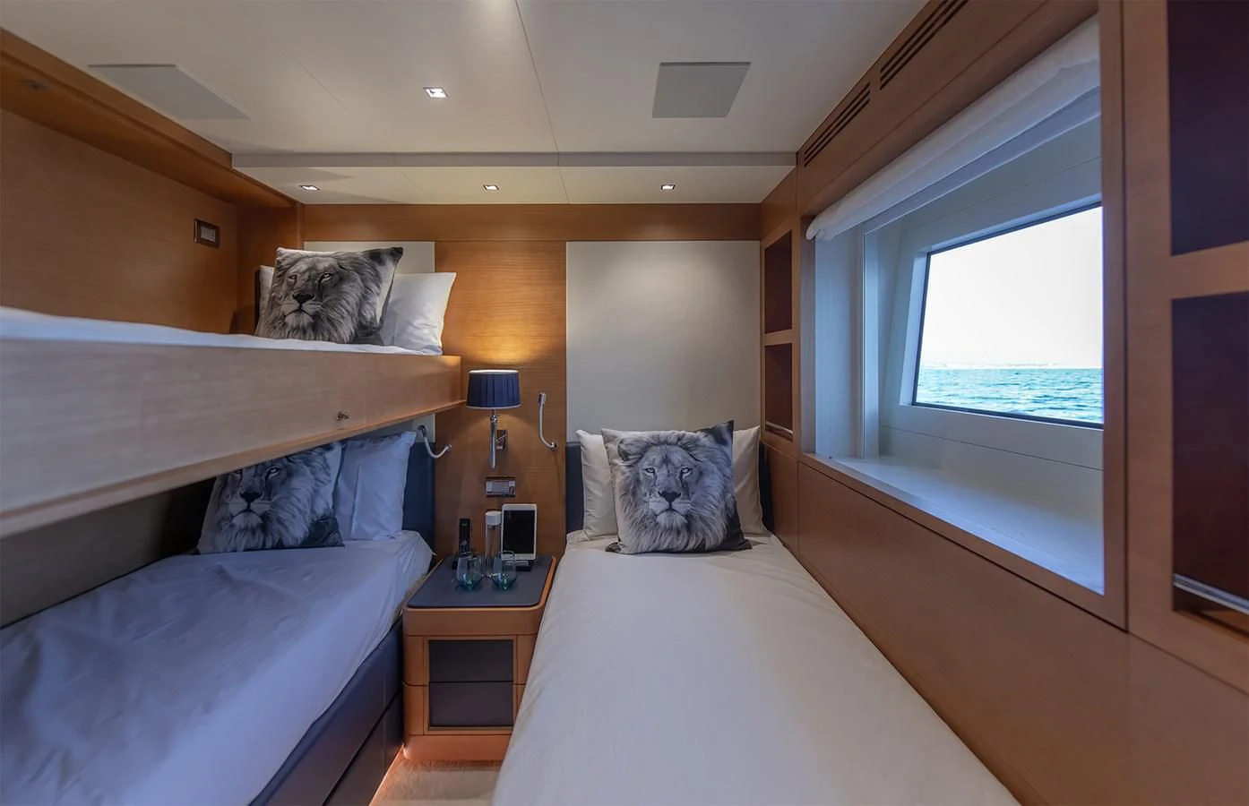 a room with two beds aboard TONIC BLUE Yacht for Sale