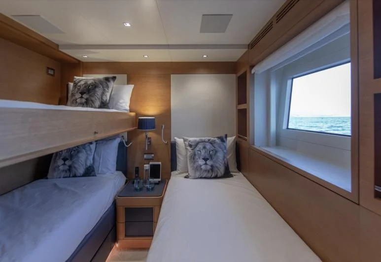 a couple of beds in a room aboard TONIC BLUE Yacht for Sale