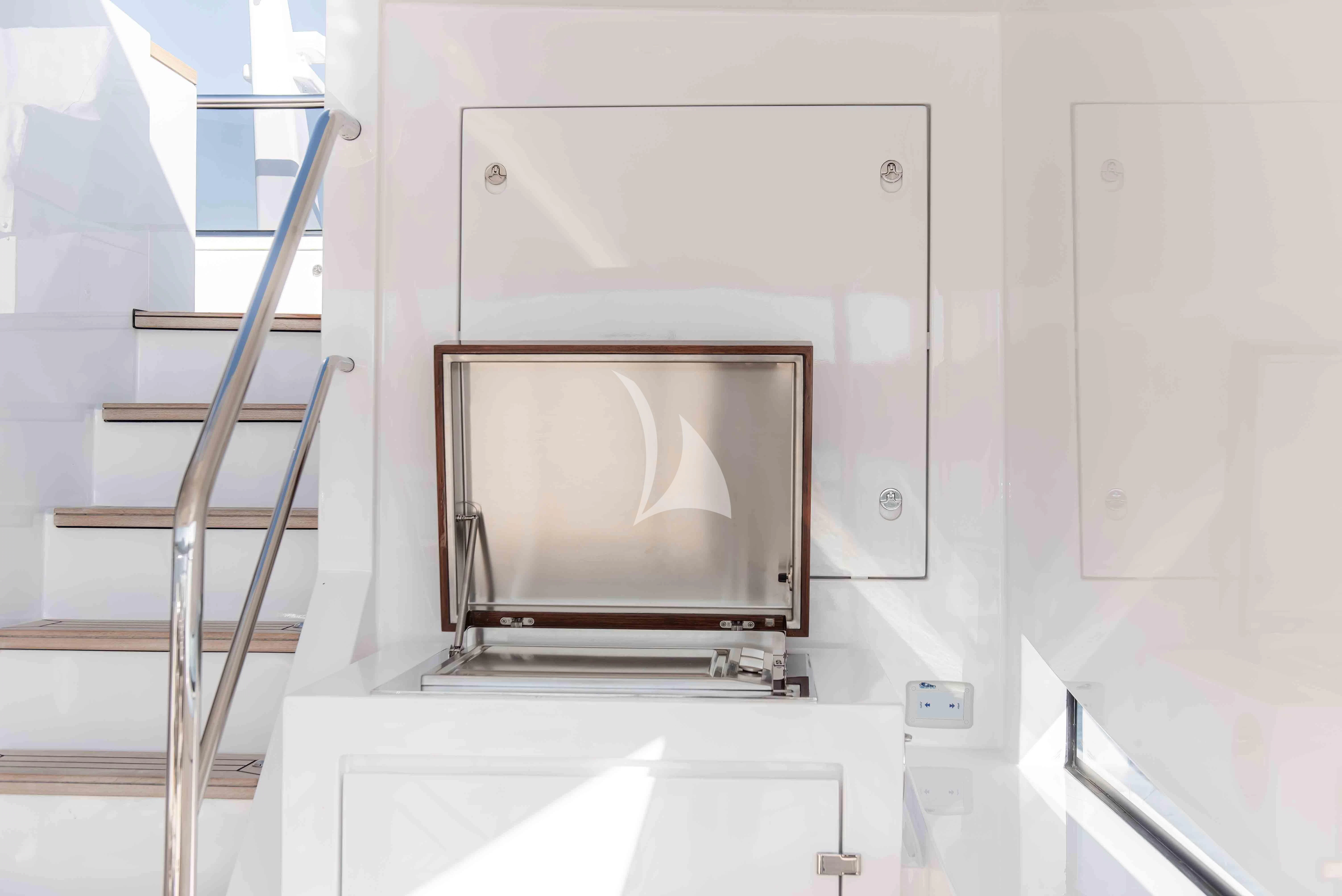 a white rectangular object with a screen aboard TONIC BLUE Yacht for Sale