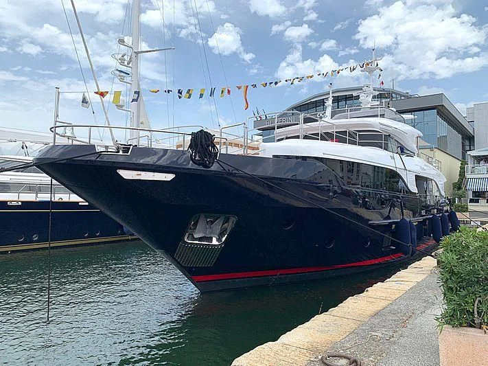 a boat docked at a pier aboard TONIC BLUE Yacht for Sale
