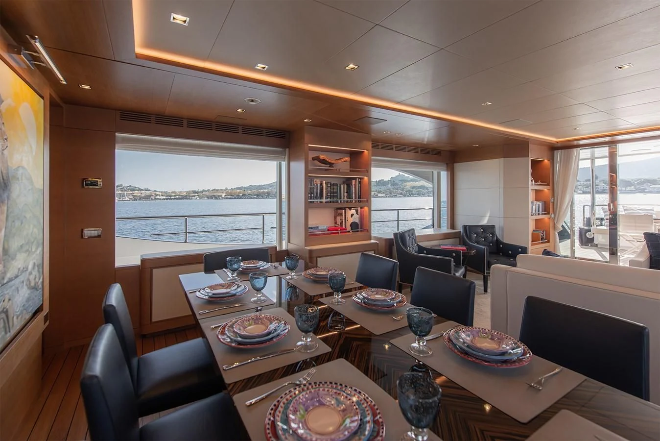 a large living room with a large window aboard TONIC BLUE Yacht for Sale