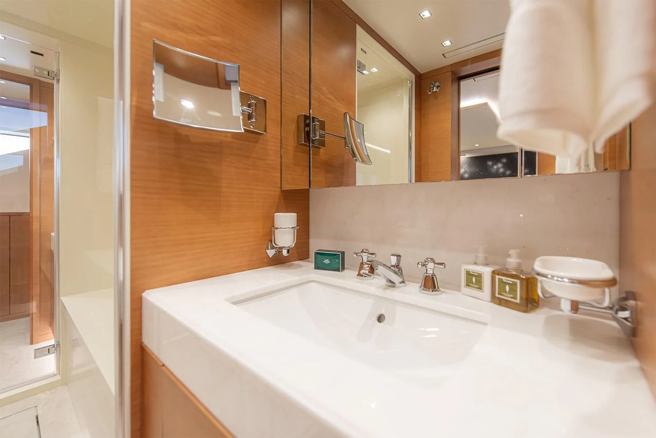 a bathroom with a large mirror aboard TONIC BLUE Yacht for Sale