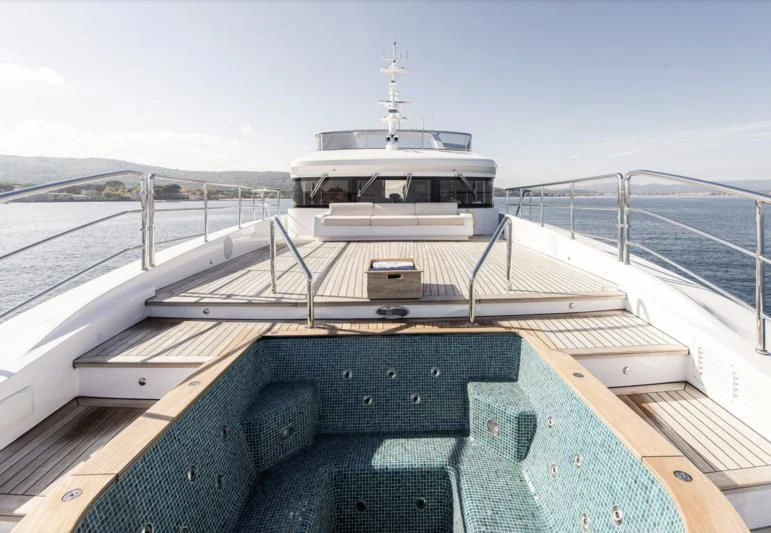 a boat on a dock aboard TONIC BLUE Yacht for Sale