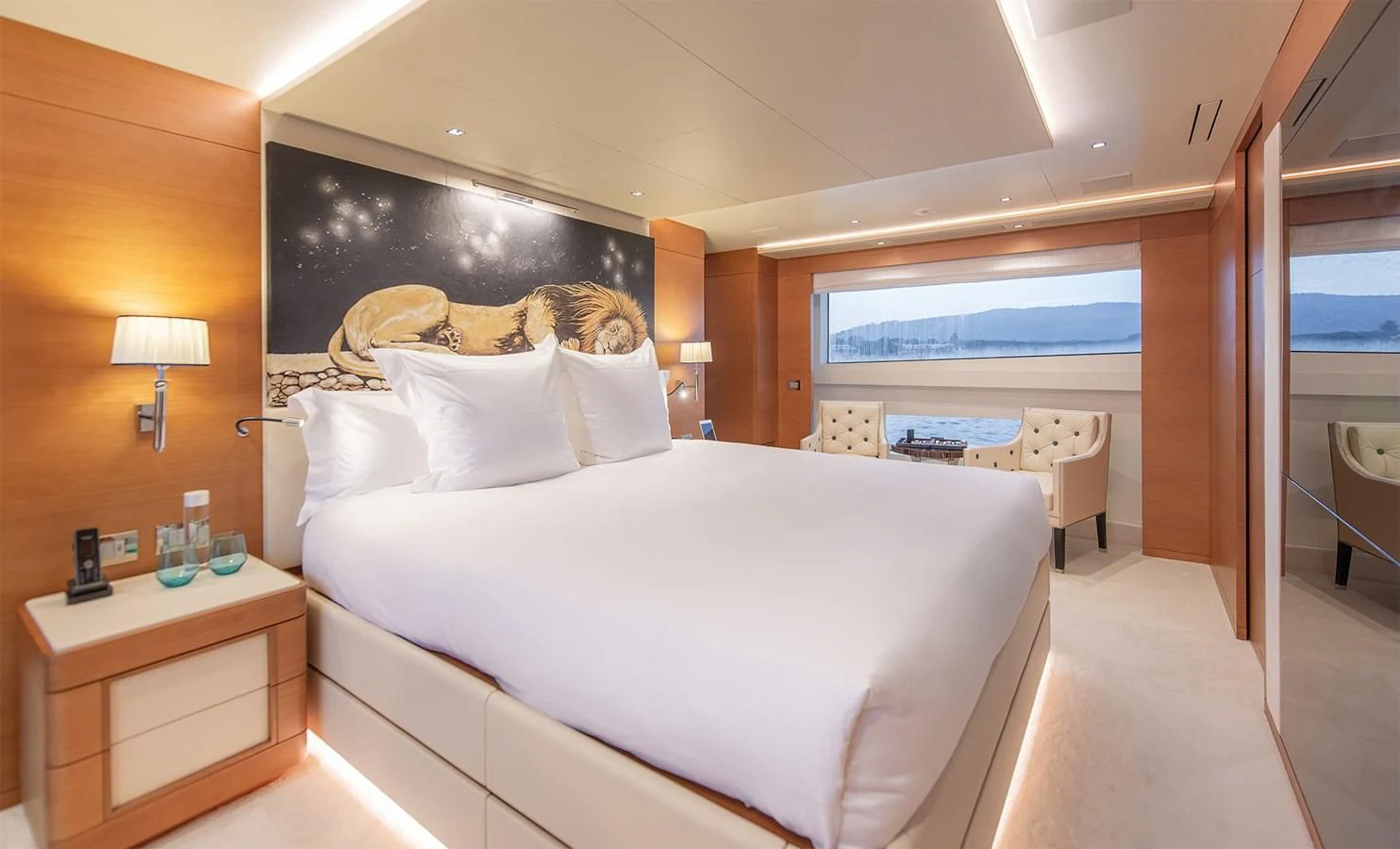 a hotel room with a bed aboard TONIC BLUE Yacht for Sale