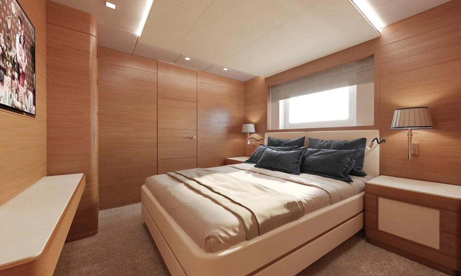 a room with a bed and a desk aboard TONIC BLUE Yacht for Sale