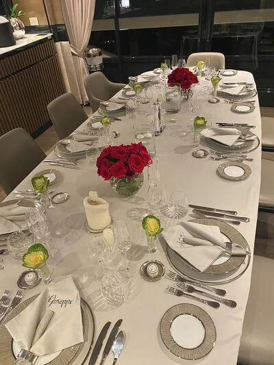 a table set with place settings aboard SOLEIL Yacht for Sale