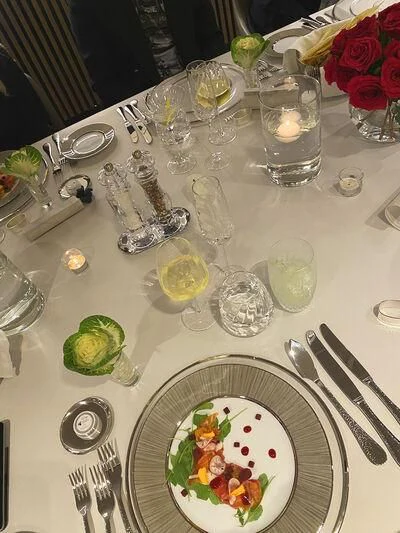 a table with plates and glasses aboard SOLEIL Yacht for Sale