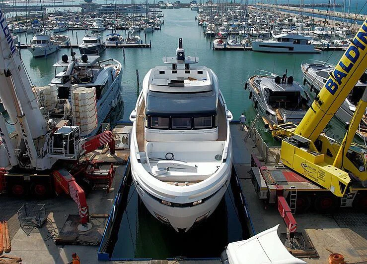 a boat docked at a port aboard SOLEIL Yacht for Sale