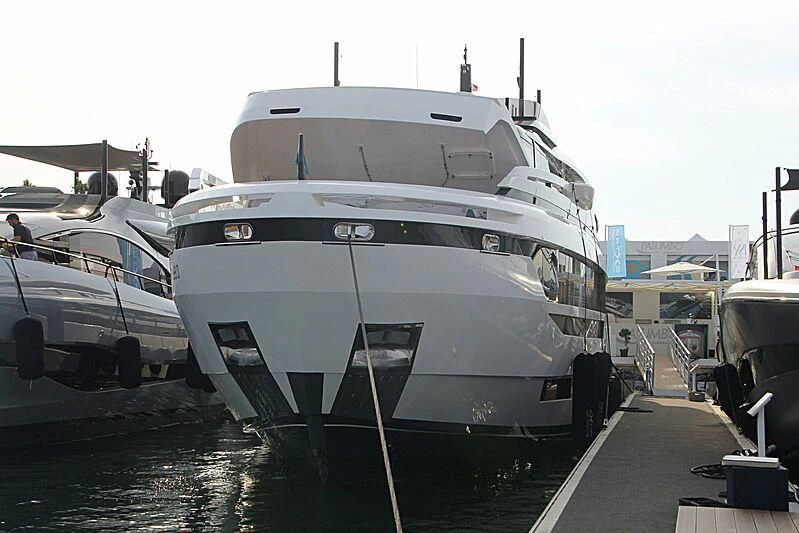 a large white boat docked aboard SOLEIL Yacht for Sale
