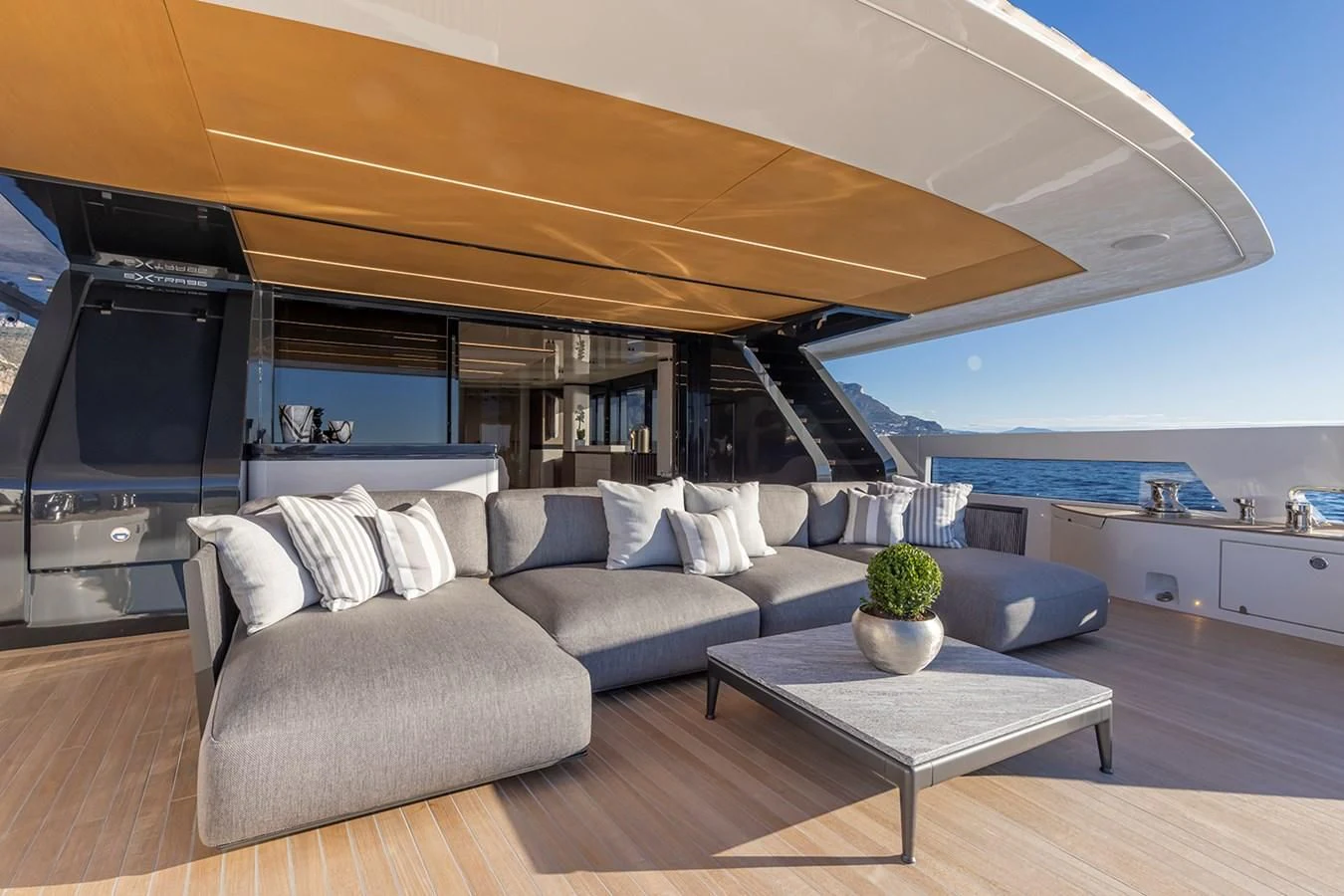 a living room with a large sofa aboard SOLEIL Yacht for Sale
