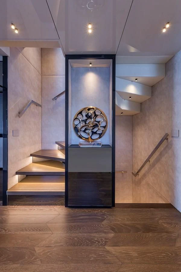 a large room with a large blue door and a round window aboard SOLEIL Yacht for Sale