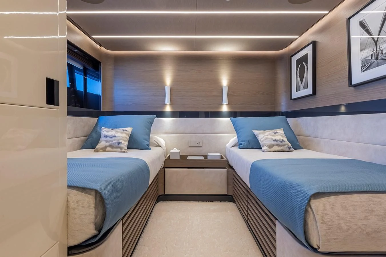 a room with beds and a window aboard SOLEIL Yacht for Sale