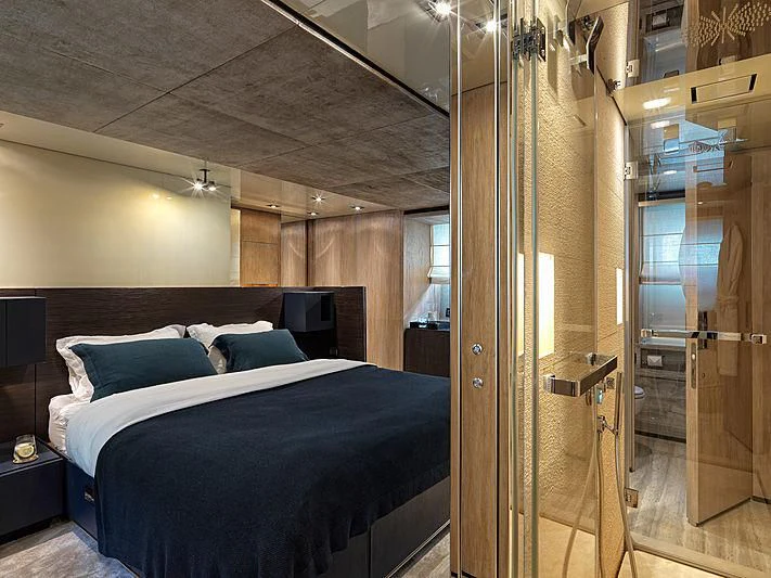 a bed in a room aboard CASA Yacht for Sale
