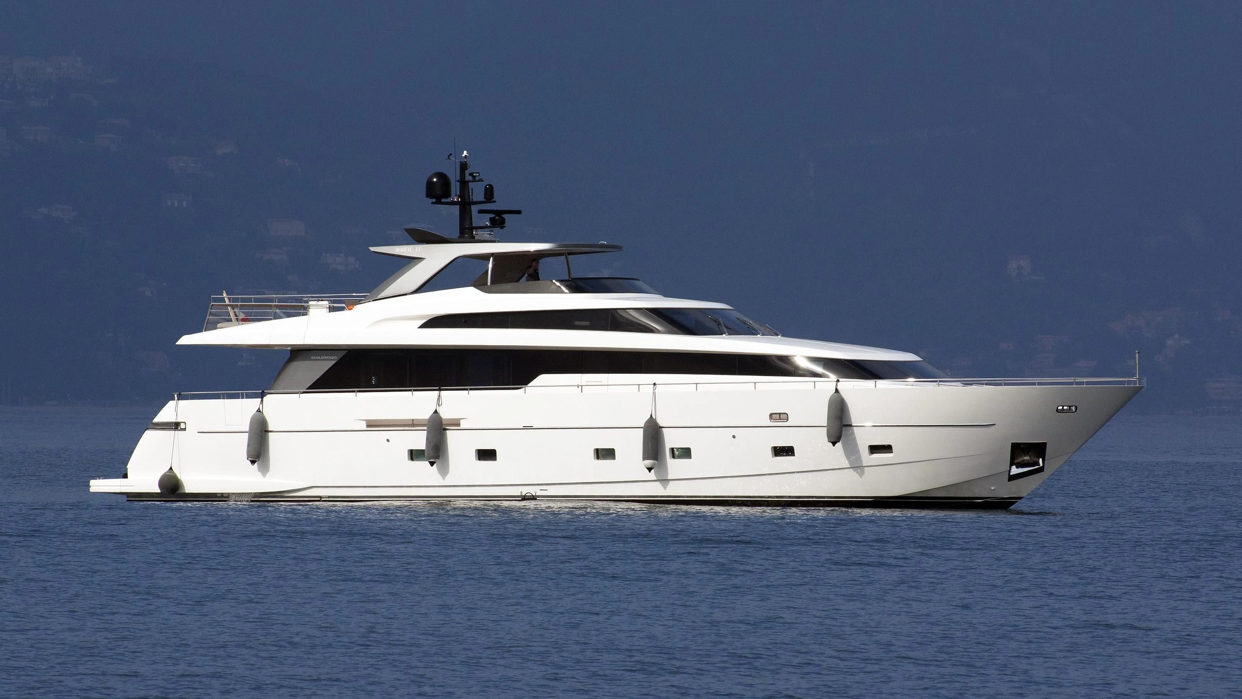 a white yacht in the water aboard CASA Yacht for Sale