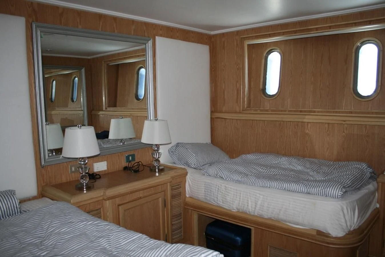 a room with two beds aboard SCUBA SCENE Yacht for Sale