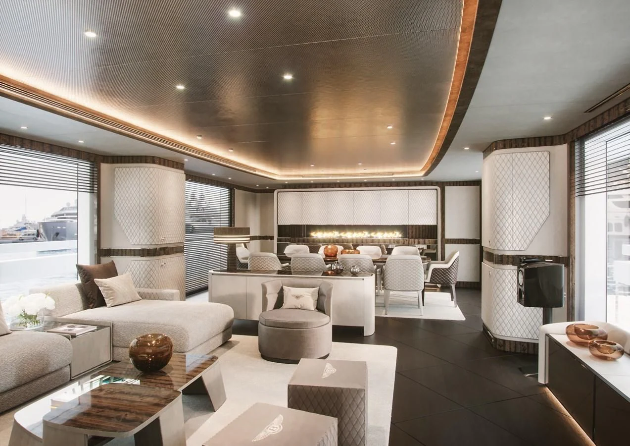 a living room with a large window aboard DYNAMIQ GLOBAL 350 Yacht for Sale