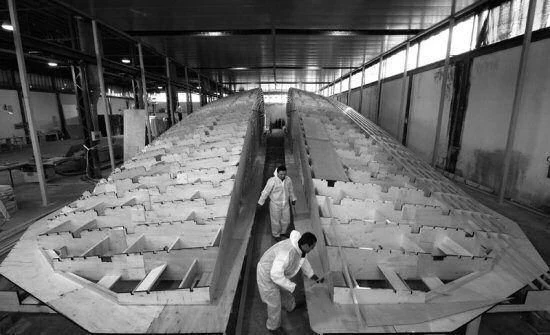 men working in a factory aboard BETTER PLACE Yacht for Sale