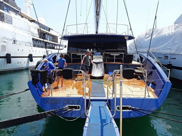 a group of people on a boat aboard BETTER PLACE Yacht for Sale