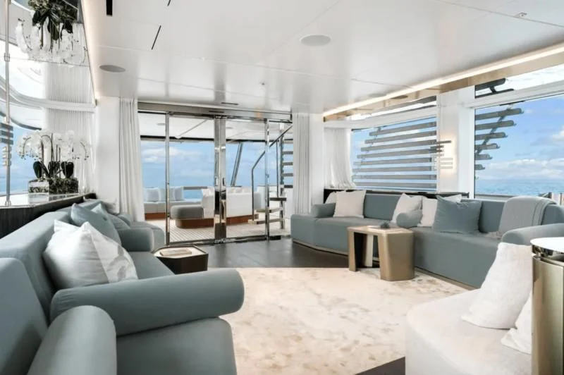 a living room with a large glass window aboard FIFTH SEASON Yacht for Sale