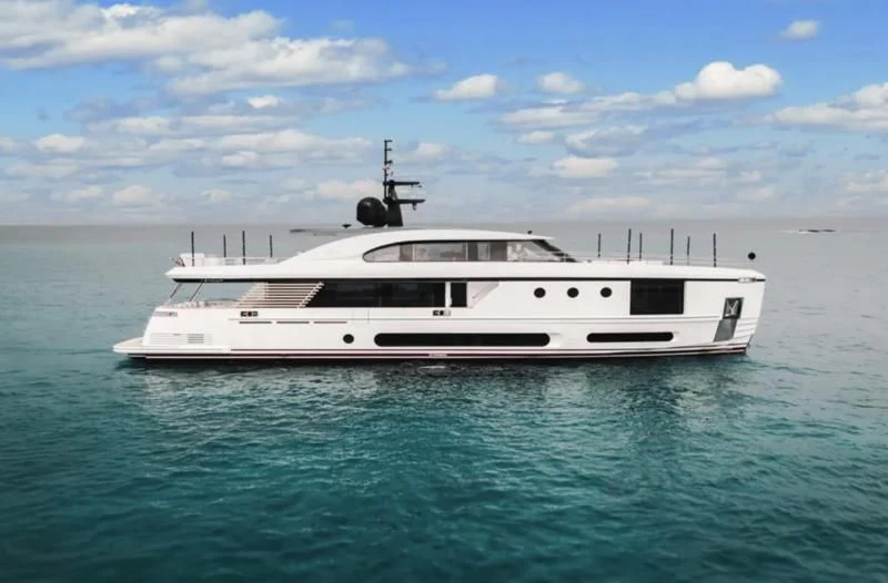 a white boat in the water aboard FIFTH SEASON Yacht for Sale