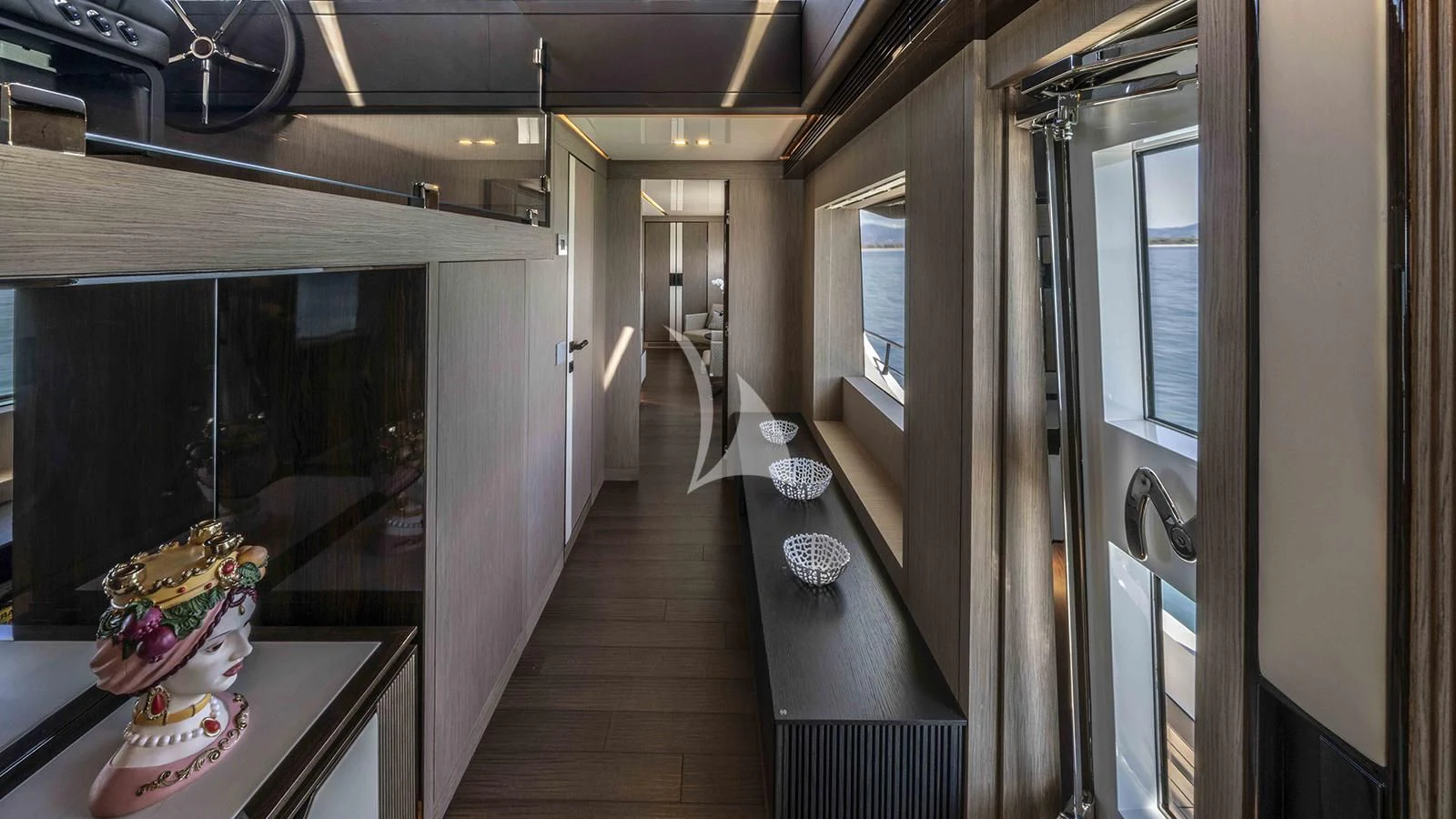 a train with a table and chairs aboard FOUR JOYS Yacht for Sale