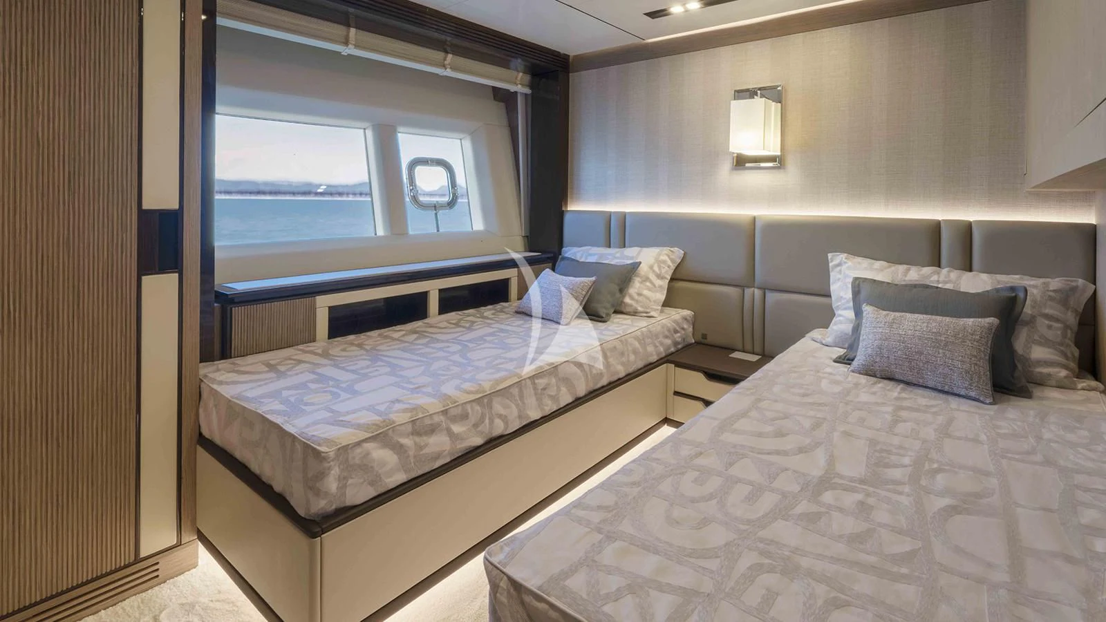 a room with two beds aboard FOUR JOYS Yacht for Sale
