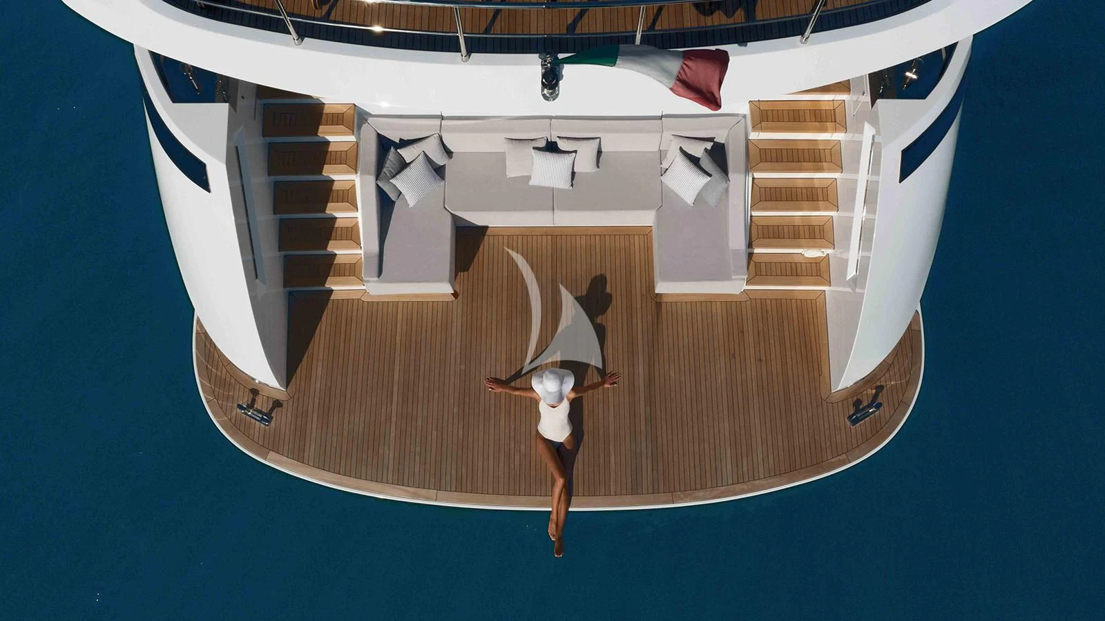 a boat with a couple of people on it aboard FOUR JOYS Yacht for Sale