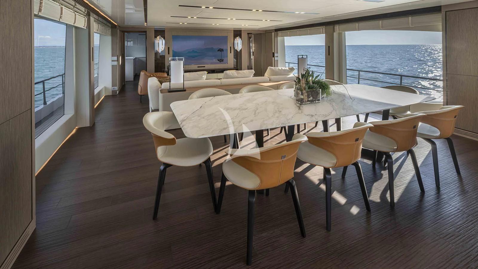 a large room with a table and chairs aboard FOUR JOYS Yacht for Sale