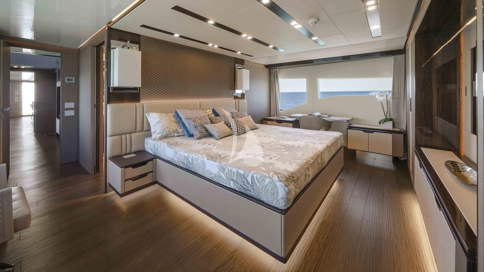 a large bedroom with a large bed aboard FOUR JOYS Yacht for Sale