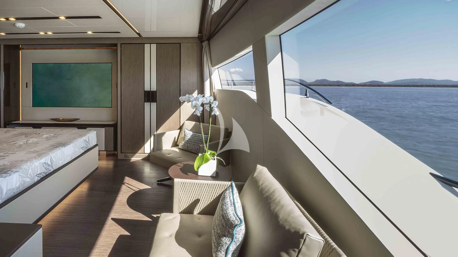 a room with a bed and a television aboard FOUR JOYS Yacht for Sale