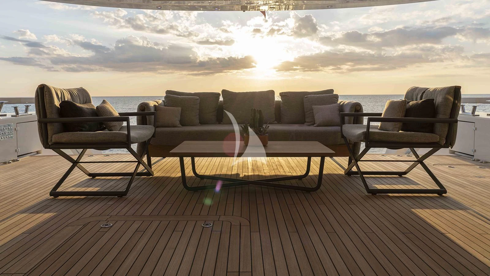 a room with couches and chairs aboard FOUR JOYS Yacht for Sale