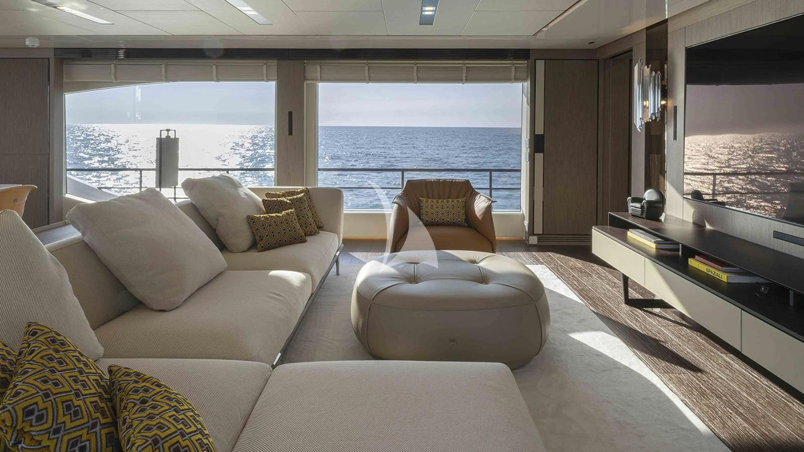 a living room with a large window aboard FOUR JOYS Yacht for Sale