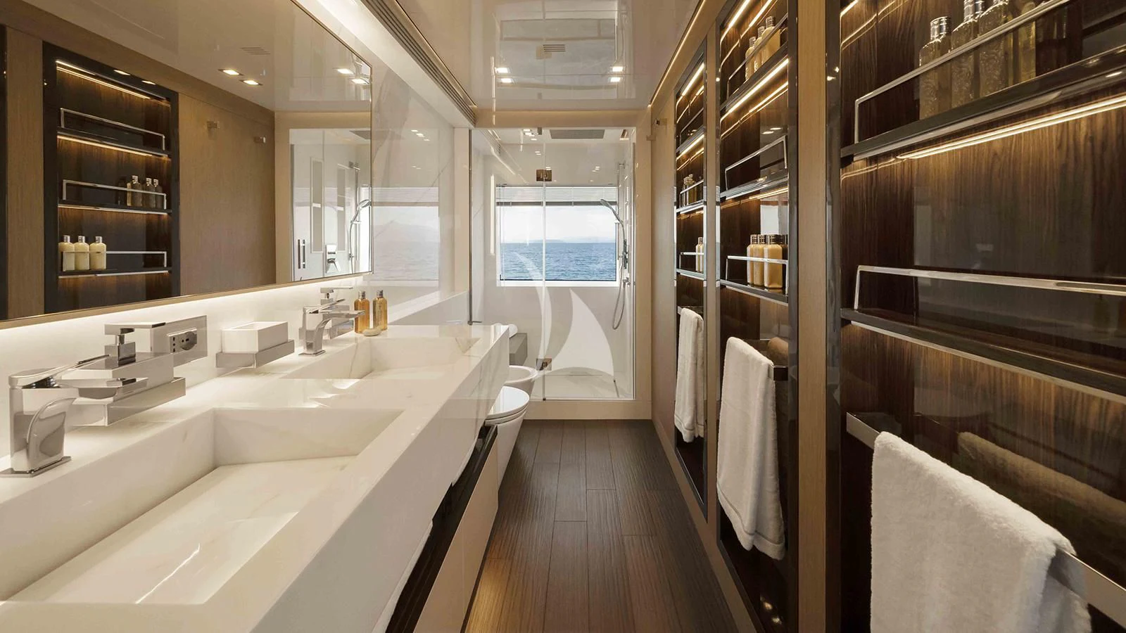a bathroom with a large mirror aboard FOUR JOYS Yacht for Sale